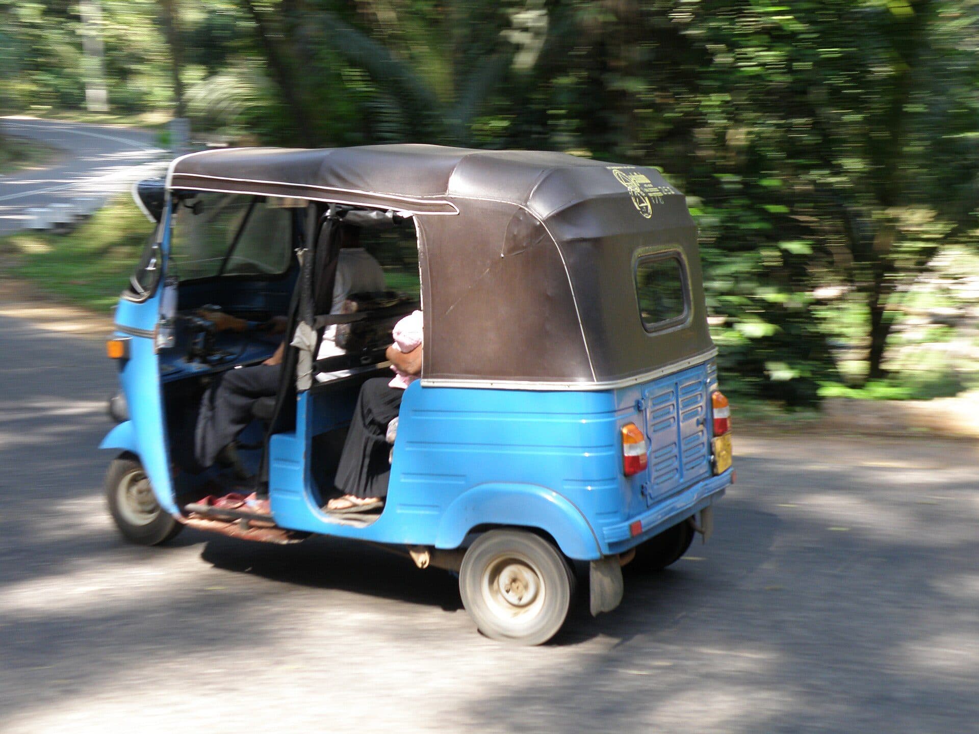 A tuk-tuk on a Sri Lankan road